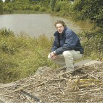 The general manager of Norwood Gardens, Southwell, Mr Henry Starkey, at the highest point flood water reached as it channelled into a balancing pond built to soak up excess water.