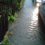 water (clear not muddy) over the pavement depth of kerb 7 cm
