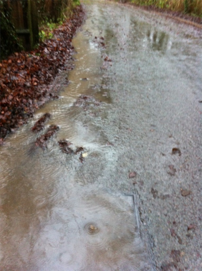20/12/2012 Blocked drain on Hopkiln Lane and excess water from Halam Road due to blocked drains by Ben Huson