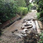 The collapsed brickwork is what was formerly walls along the edge of the bridge on our driveway over the dyke. These collapsed due to the force of the water coming down the dyke.