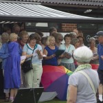 The Choral Society & Daytime Voices singing “The Rain Came Down”