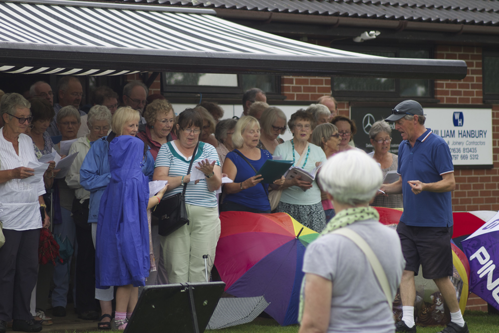 The Choral Society & Daytime Voices singing "The Rain Came Down"